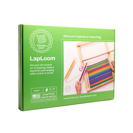 Box showing a rainbow tapestry being created on a wooden lap loom