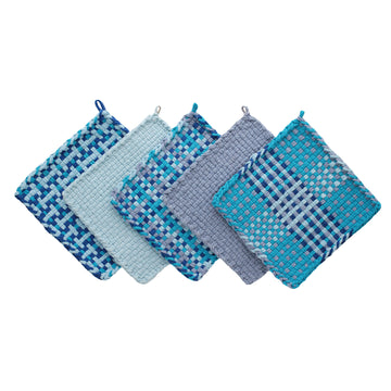 Five patterned and solid color potholders made of pro loops in shades of blue